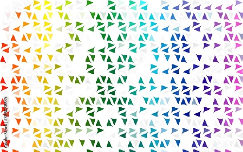 Light Multicolor  Rainbow vector texture in triangular style.