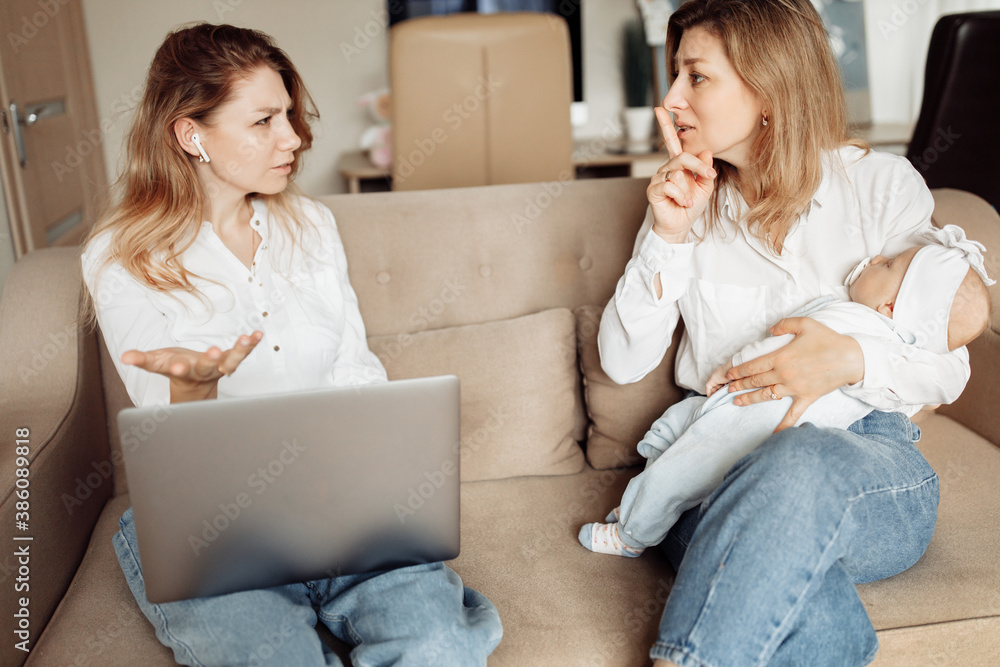 Young mother working from home, talking with colleague, caring grandmother babysit with little granddaughter, ask to speak quieter, because baby girl is sleeping, childcare concept Young mother working from home, talking with colleague, caring grandmother babysit with little granddaughter, ask to speak quieter, because baby girl is sleeping, childcare concept