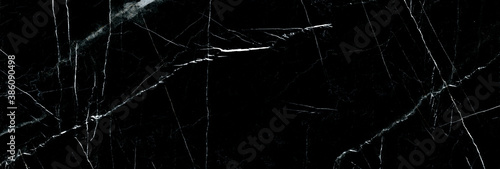 natural black marble texture with white veins, dark marble texture background for ceramic tile, black onyx marble texture, luxurious dark black agate marble texture polished quartz stone background.