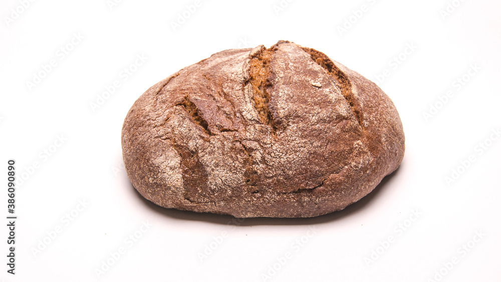 Round grey bread on white background Round grey bread on white background