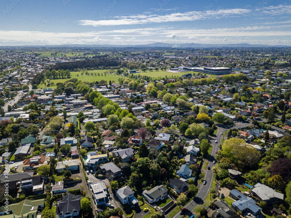 Fototapeta premium Aerial drone view looking at Claudelands park, oval and events centre in the city of Hamilton, in the Waikato region of New Zealand