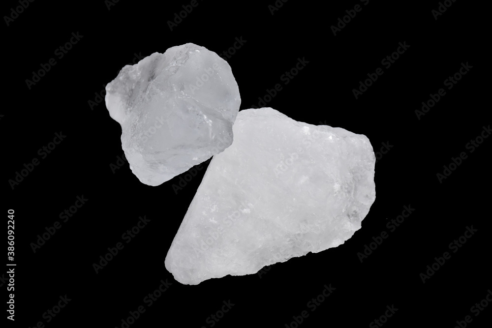 White alum cubes on black background, concept for applying underarms to reduce body odor and swing the cloudy water into the sediment. White alum cubes on black background, concept for applying underarms to reduce body odor and swing the cloudy water into the sediment.