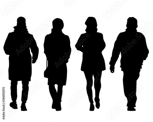 Crowds people walking on street. Isolated silhouette on a white background