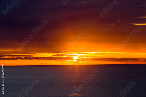 Panoramic nature background  mountains  sea  trees  twilight lights in the sky  waterfront communities   naturally blurred through the wind  seen on tourist spots or scenic spots