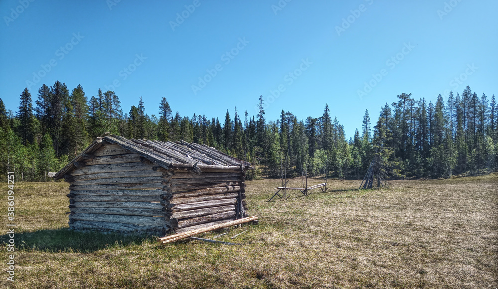 Back of log hut in Bergmyran, a part of Gallejaur Kulturreservat in Norrbotten, Sweden Back of log hut in Bergmyran, a part of Gallejaur Kulturreservat in Norrbotten, Sweden