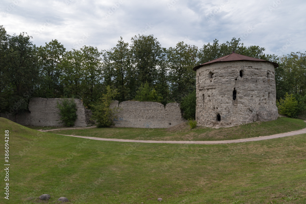 Pskov, Mikhailovskaya fortress tower and a fragment of the wall of the Roundabout city, an interesting tourist place