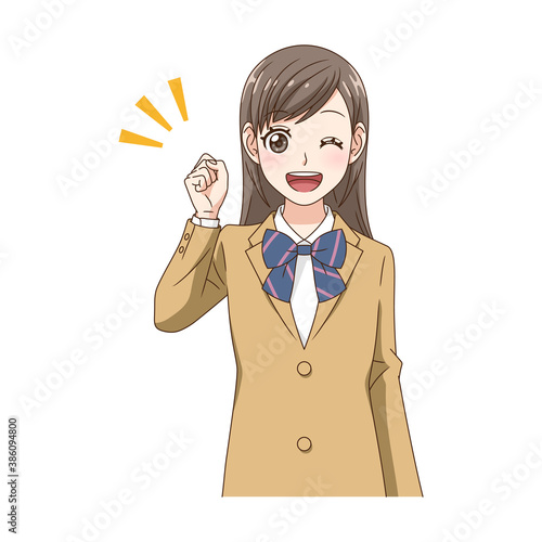 笑顔でガッツポーズする制服の女の子