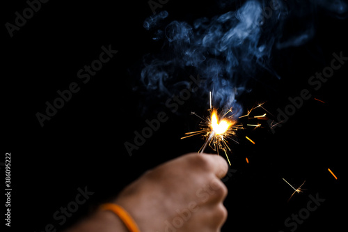 The burning sparklers diwali festival. Celebrating Diwali in india.