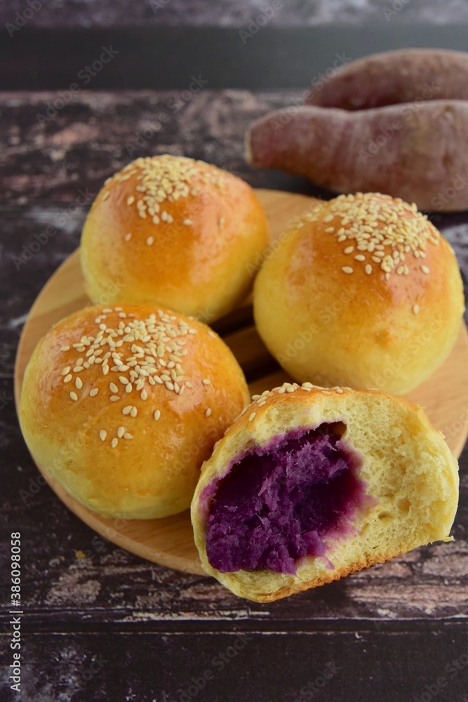 Sesame seed bread buns filled with purple sweet potato / yam puree Sesame seed bread buns filled with purple sweet potato / yam puree