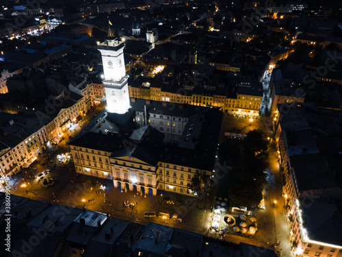 Fototapeta Naklejka Na Ścianę i Meble -  night aerial view of old european city with tight streets