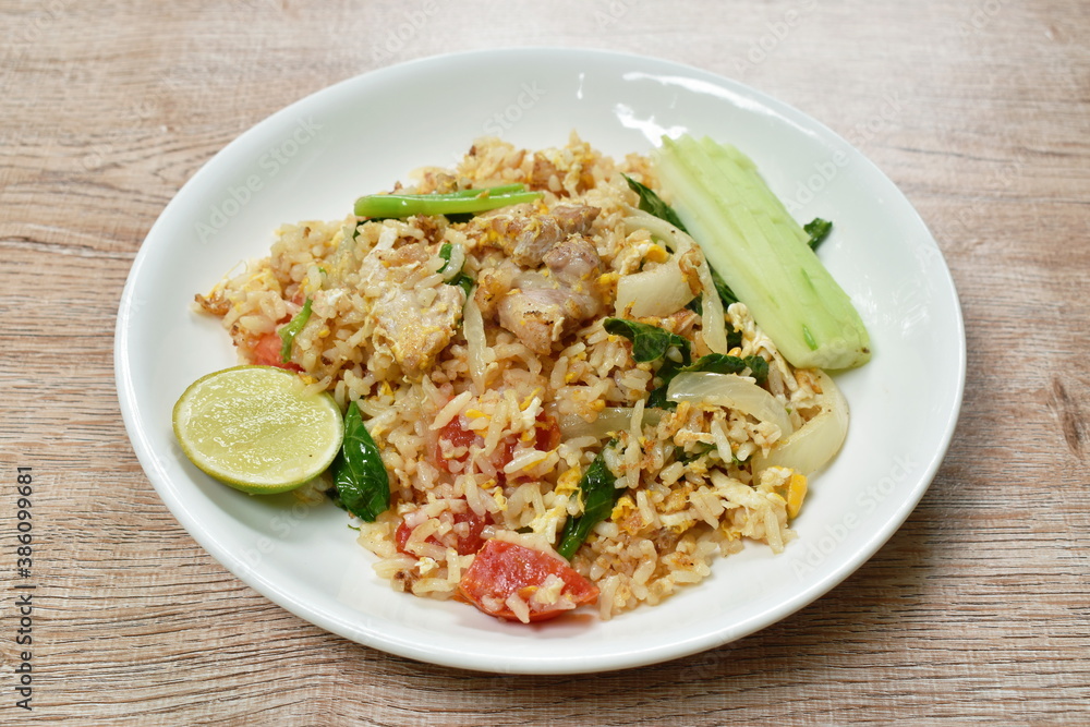 fried rice pork and Chinese kale with egg on plate fried rice pork and Chinese kale with egg on plate