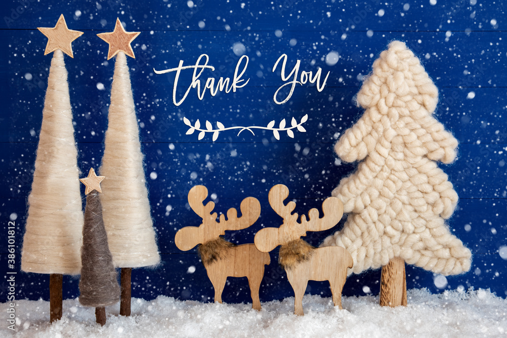 English Calligraphy Thank You On Blue Background With Snow. Decoration And Ornament Like Christmas Trees And A Moose Couple With Snowflakes.