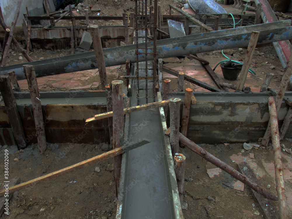   Photo Cement Walkway Brick Construction Background With steel bars                     