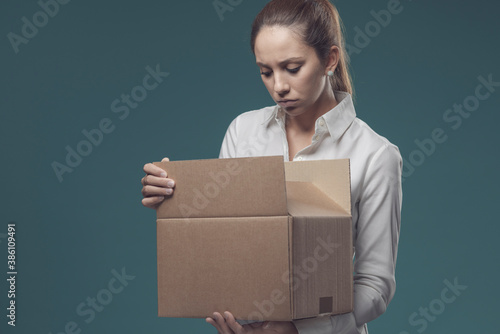 Disappointed woman receiving the wrong delivery