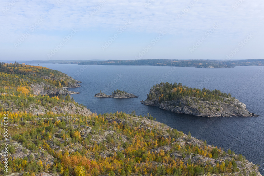Obraz premium Karelia. Russia. Ladoga. Ladoga skerries. Stone islands in Ladoga Lake. Nature of Karelia. Travel to Russia.