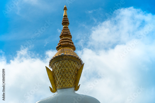 jada high hairdo on beautiful Buddha head at Wat Phachonkeaw on Khao Kho hill the beautiful landmark and famous in Petchabun Thailand. photo