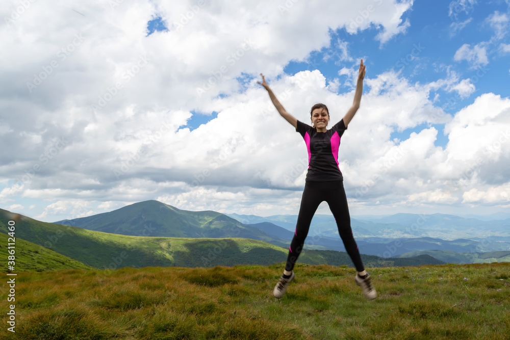 Beautiful girl in a jump, among the beautiful mountains. Beautiful girl in a jump, among the beautiful mountains.