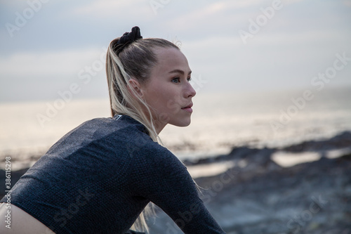 young woman fitness portrait on the beach © Megan