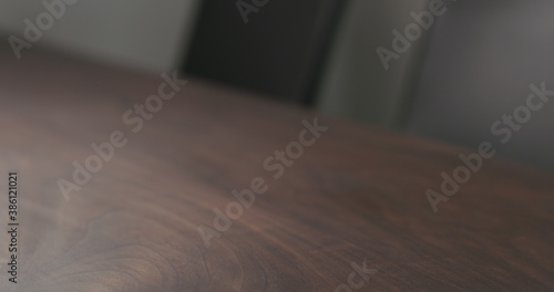 Empty dark walnut dining table