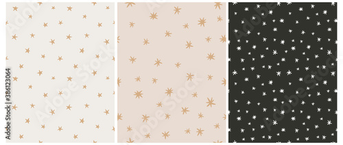 Simple Irregular Starry Seamless Vector Patterns. Simple Hand Drawn Stars Isolated on a Black and Beige Background. Funny Infantile Style Repeatable Abstract Night Sky Print.