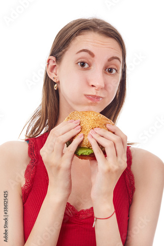 girl eats cheeseburger