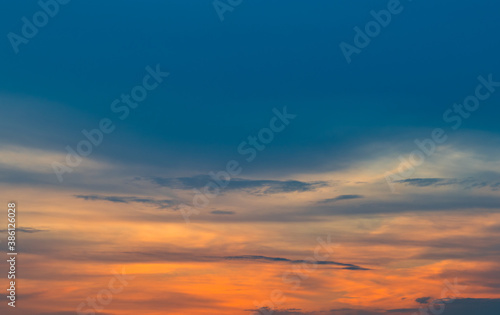 Beautiful orange clouds in the sunset sky © E.O.