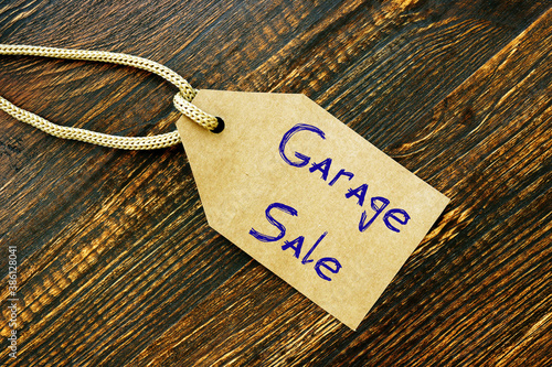 Business concept about Garage Sale with sign on the sheet.