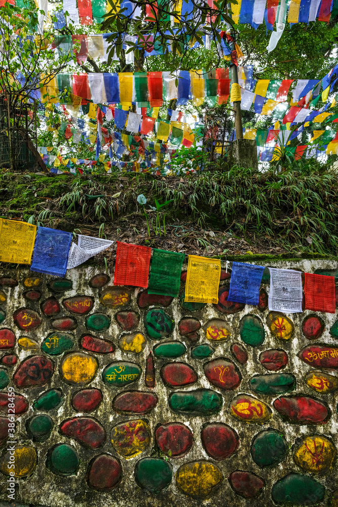 Darjeeling, India - October 2020: Prayer flags at the Mahakal temple on Observatory Hill on October 13, 2020 in Darjeeling, West Bengala, India. Darjeeling, India - October 2020: Prayer flags at the Mahakal temple on Observatory Hill on October 13, 2020 in Darjeeling, West Bengala, India.