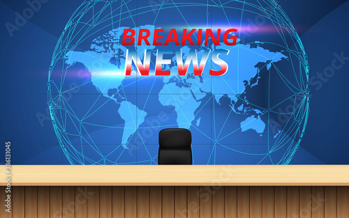 wooden table and breaking news on  lcds background in the news studio room	
