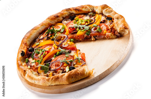 Pizza with ham, mozzarella, champignon and corn on white background