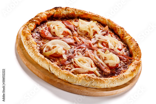 Pizza with ham, mozzarella, champignon, tomatoes and onion on white background
