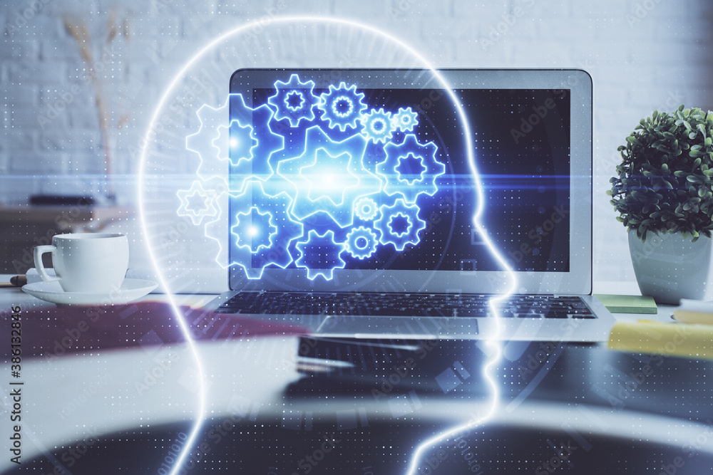 Double exposure of work space with computer and human brain drawing hologram. Brainstorm concept. Double exposure of work space with computer and human brain drawing hologram. Brainstorm concept.