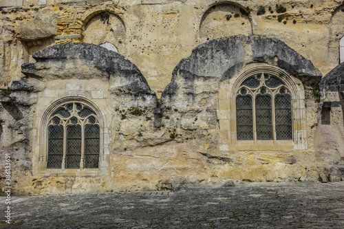 Wallpaper Mural XII century Monolithic Church (Eglise Monolithe) with 68-meter bell tower in the center of town Saint Emilion. Monolithic Church - largest underground church in Europe. Saint Emilion, Gironde, France. Torontodigital.ca
