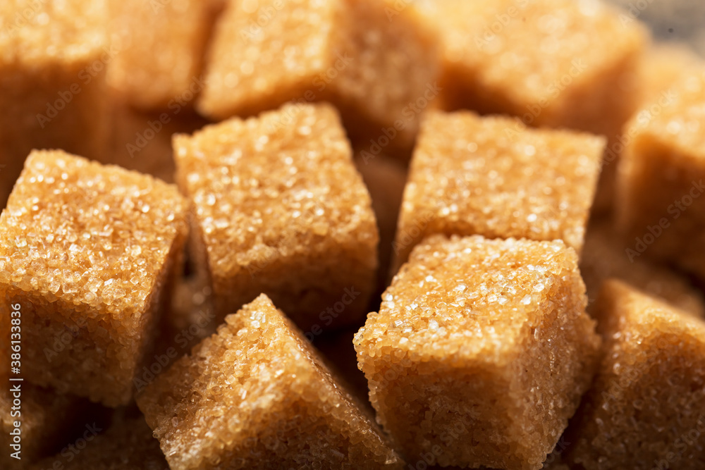 Pieces of brown sugar close-up macro, close up Pieces of brown sugar close-up macro, close up