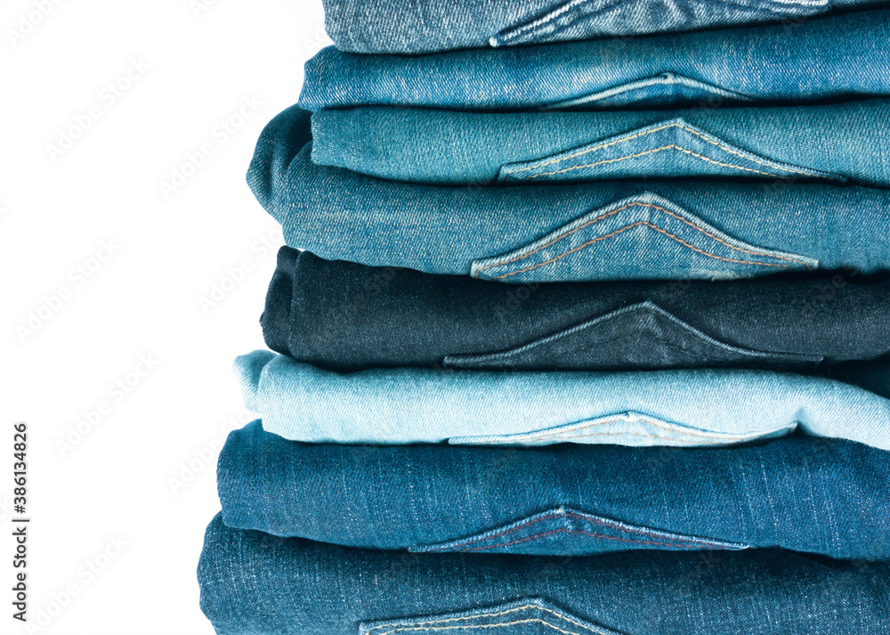 jeans stacked isolated on white background. jeans stacked isolated on white background.