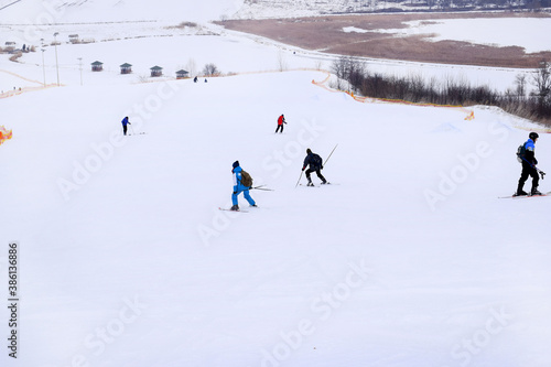  winter landscape snow people skiing back view
