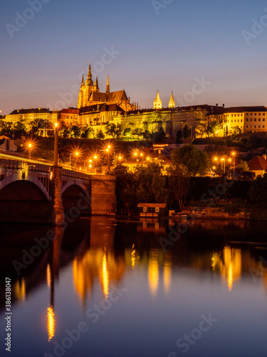 Prague castle across the Vltava river in the evening light © jeepston