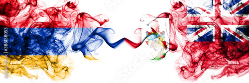 Armenia vs British, Britain, Bermuda smoky mystic flags placed side by side. Thick colored silky abstract smoke flags