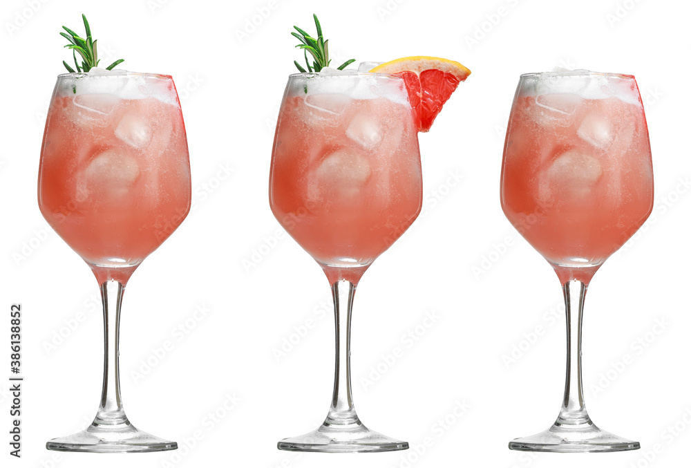 Alcoholic drink with tropical fruits and herbs and ice. Three alcoholic cocktails isolated on white.copy space Alcoholic drink with tropical fruits and herbs and ice. Three alcoholic cocktails isolated on white.copy space