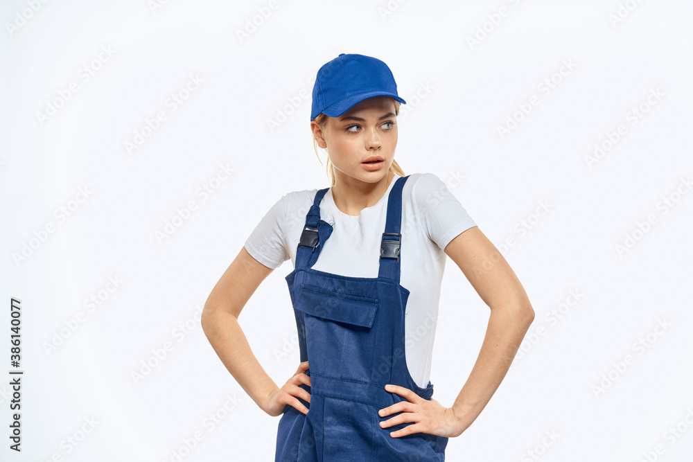Woman in working uniform blue cap delivery courier delivery service