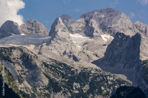 The Dachstein mountain range and visible glacier ice during summertime (Gosau, Upper-Austria)