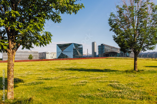 Photography cityscape view of the main train station in berlin seen from a park at the river