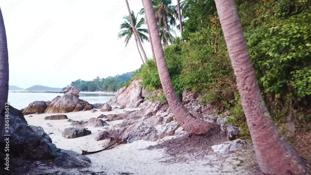 Tropical rockbeach with coconut palm trees. Koh Samui, Thailand. High quality FullHD footage Tropical rockbeach with coconut palm trees. Koh Samui, Thailand. High quality FullHD footage