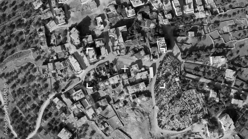  Air strike on Terrorist home, drone attack view
Drone view over village in middle east bombarding target
