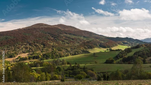 Time Lapse 4K Footage of Tarnica Peak in Bieszczady Mountains at Fall Season. Colorful Grass and Foliage on Trees on Poloniny. Autumn Vibes and Clouds Moving on Sky.