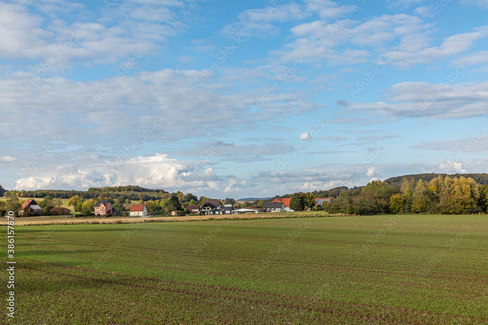 rural landscape with fields in the Lippe Region at Horn, village of Fromhausen,