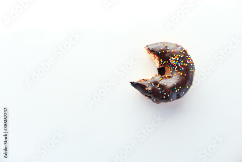 Fotografija top view of half eaten donuts isolated on white