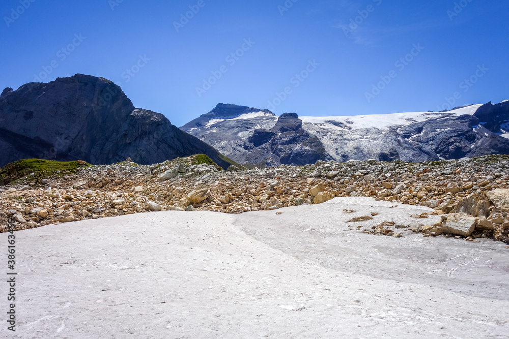 Alpine glaciers and neves snow landscape in French alps.