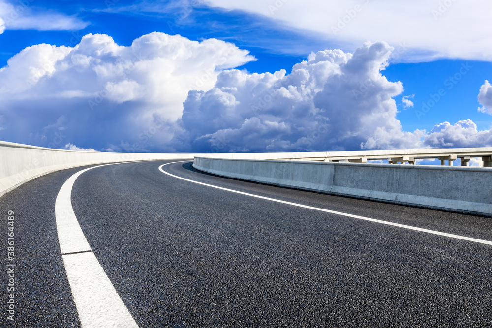 Fototapeta premium New asphalt road and mountain with sky cloud natural scenery.