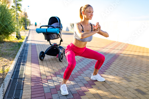 blonde beautiful woman ready to be the best mother and getting in shape after giving birth in tropics background beach